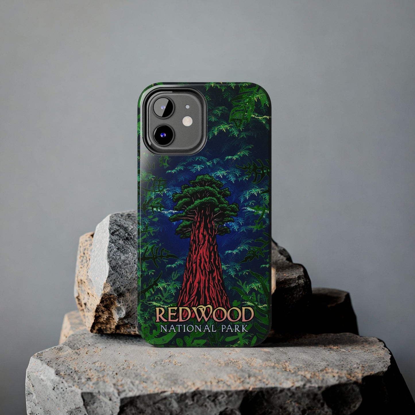 Phone case with Redwood National Park design on a gray background